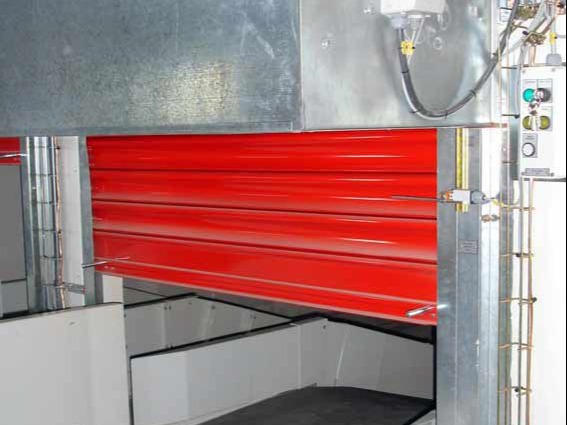The Conveyor Rolling Door is a great and versatile solution for conveyor belts openings, providing safety and security features like solid curtain or grille curtain, Impact and Wind rating, Insulation, Fire rating, smoke rating and more.